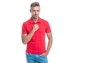 handsome man with grizzled hair in red shirt isolated on white background. denim.