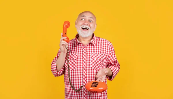 Happy Senior Man Retro Telephone Yellow Background — Foto Stock