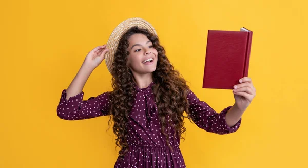 Cheerful Child Frizz Hair Recite Book Yellow Background — Foto Stock