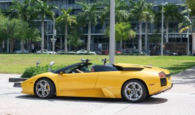 Miami Beach, Florida USA - April 15, 2021: yellow lamborghini diablo v12 6.2L, side view. convertible supercar.