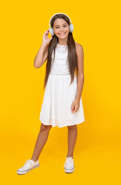 Positive Teen Girl Listen Music Headphones Yellow Background — Stockfoto