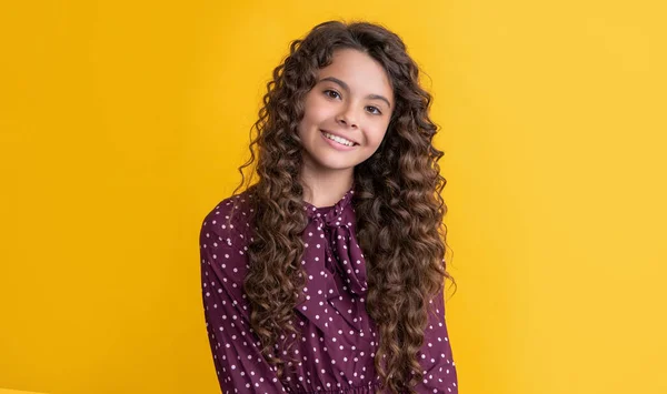 Glad Kid Long Brunette Curly Hair Yellow Background — Foto Stock