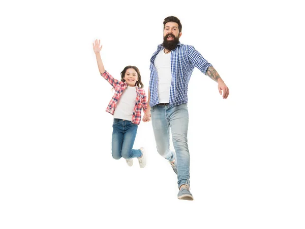 Jump high and love your family. Happy family. Family of father and little daughter jumping with joy. Bearded man and small girl child celebrating family day together.