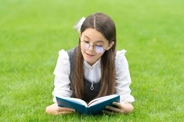 Serious Schoolgirl Reading Book Lying Grass Reading Teen Girl Reading — Fotografia de Stock