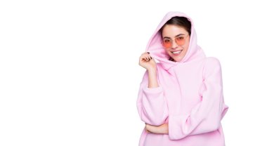Fashion girl happy smiling in pink hoodie hooded sweatshirt isolated on white.