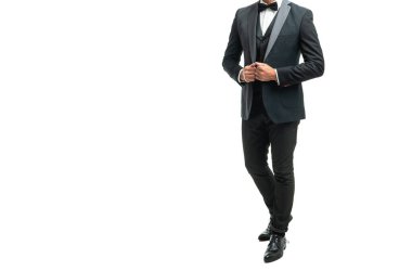 hoary elegant man waiter with bowtie isolated on white background. full length.