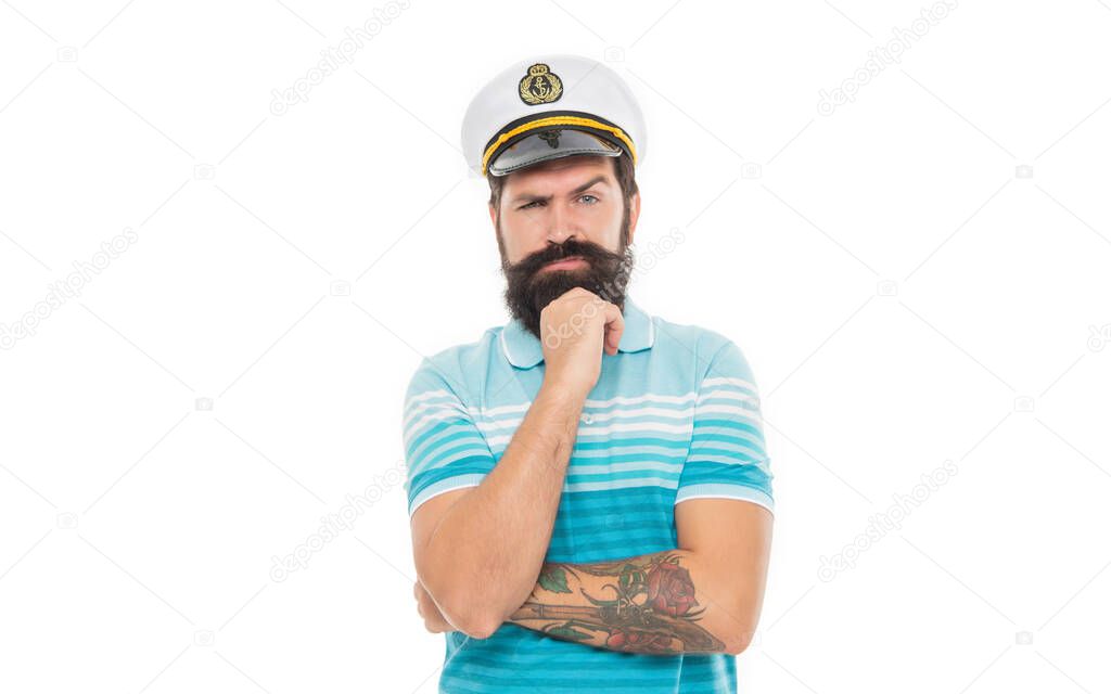 Thoughtful man wearing captain hat. Bearded man thinking isolated on white. Man sailor with beard and moustache.