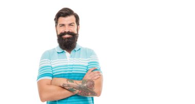 Happy unshaven man keeping arms crossed. Confident man with beard smile. Bearded man isolated on white, copy space