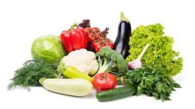 Variety of fresh ripe organic vegetables natural vegetarian food isolated on white.