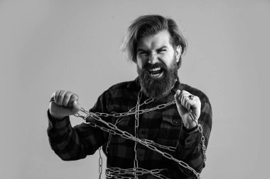 Zincirlenmiş acı çeken adam krampları ve kas spazmlarını hissediyor, neredeyse özgür..