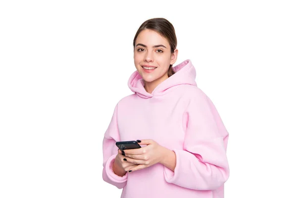 Happy Girl Casual Pink Hoodie Using Mobile Phone Isolated White — Fotografia de Stock