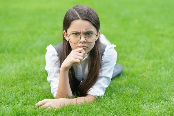 School Education Frown Teen Girl Glasses Lying Grass School Back — Stockfoto
