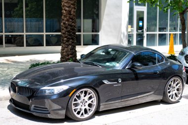 Miami Beach, Florida USA - April 15, 2021: 2010 BMW Z4 sDrive35i roadster car, side view.