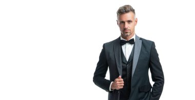 elegant man waiter with bowtie isolated on white background. full length.
