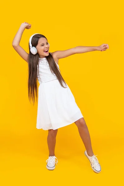 Teen Kid Listen Music Headphones Dancing Yellow Background — Stockfoto