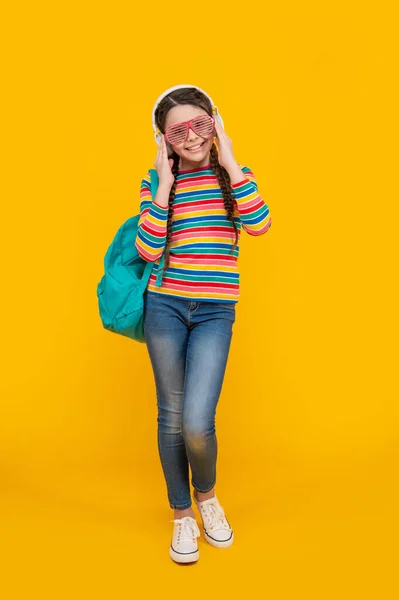 Happy Teenage Girl Listening Music School Yellow Background School Music — Fotografia de Stock