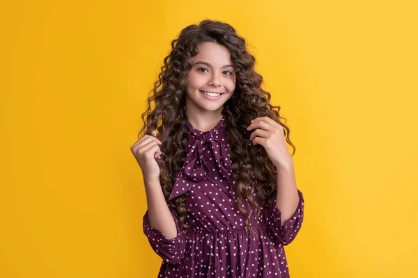 Smiling Child Long Brunette Curly Hair Yellow Background — Fotografia de Stock