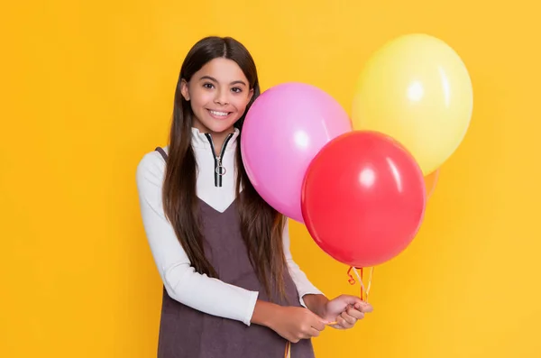 Positive Girl Party Colorful Balloons Yellow Background — стоковое фото