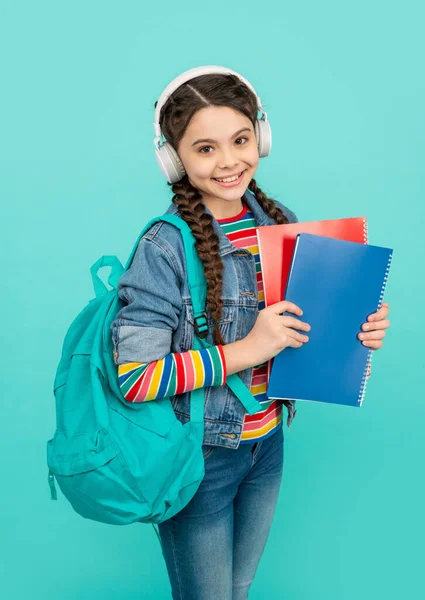 Happy Teen Girl Listening Audio Lesson Blue Background Teenager Listening — Zdjęcie stockowe