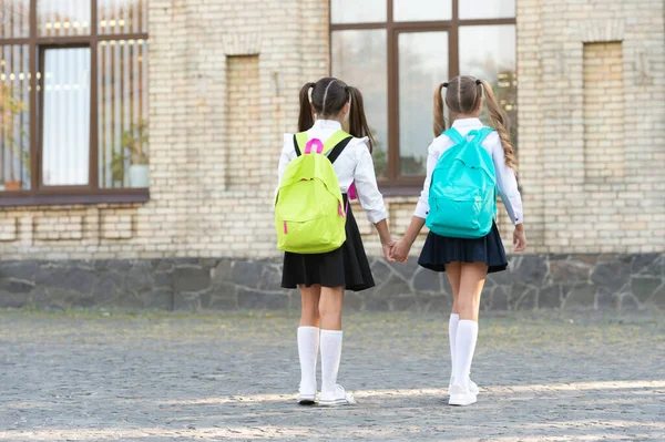 Back View Two Students School Backpack Walking Together Outdoor — Zdjęcie stockowe