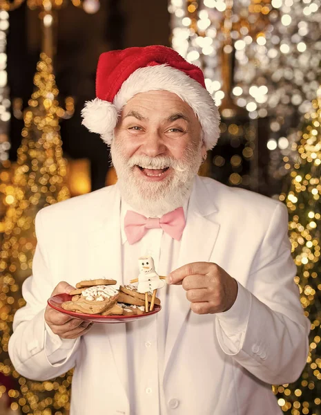 쿠키를 사업가 클라우스 모자를 사업가죠 크리스마스 단것과 사탕입니다 크리스마스 디오르 — 스톡 사진