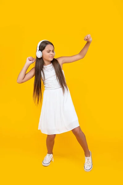 Teen Girl Listen Music Headphones Dancing Yellow Background — Stock Photo, Image