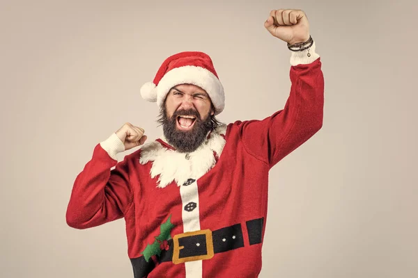 Feast of Christmas. new year party. celebrate winter holidays. merry christmas to you. xmas shopping time. prepare gifts and presents. just have fun. happy bearded mature man in santa claus costume.
