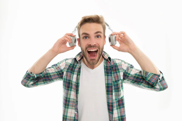Σοκαρισμένος Που Έβγαλε Ακουστικά Απομονωμένα Λευκό Στούντιο Έκπληκτος Άνθρωπος Κρατώντας — Φωτογραφία Αρχείου