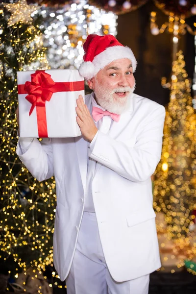 Senior man with beard. Best wishes. May this festive season sparkle and shine. Happy Santa Claus. Congratulations. Bearded grandfather man celebrate christmas. Christmas eve. Christmas corporate.