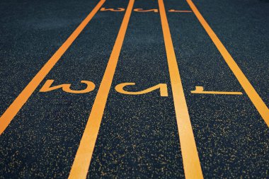 running track with 1 2 3 numbers and nobody. score track. selective focus.