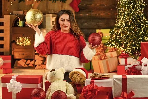 Decorate home. Xmas spirit. Santa is near. Happy girl at christmas tree. Family holiday celebration. Happy new year. Woman enjoy cozy atmosphere. Winter sale. Celebrate holiday. Holiday tradition.