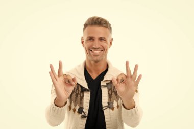 Happy caucasian man in cardigan show double OK ring gestures isolated on white, okay.