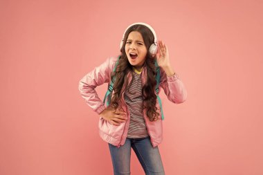 young guy in white shirt hold jacket on black background, fashion.
