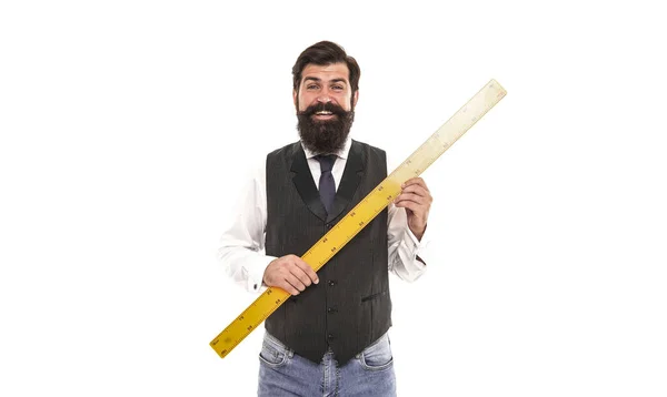 Bearded man with ruler isolated on white. Measuring his height with ...