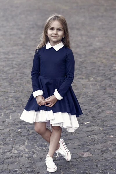 Elegance that you deserve. Little child wear uniform dress outdoors. Back to school fashion. Fashion look of small girl. School dress code. September 1. Formal education. Fashion trends for fall.