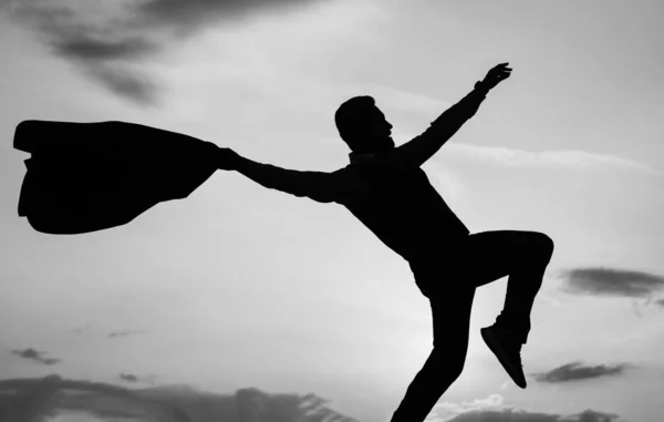 Live your life. man dancer silhouette dancing on sky background. confident businessman dance. daily motivation. enjoying life and nature. business success. freedom. personal achievement goal.