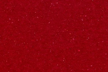 Red textured background closeup. Vintage grainy background for design