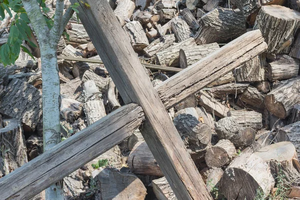 Rotten Wooden Cross Lies Next Firewood — Stock Photo, Image