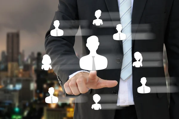 Business man pointing people icon of human resources — Stock Photo, Image