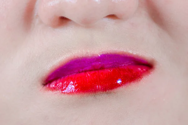 Woman lips with makeup and smirk — Stock Photo, Image