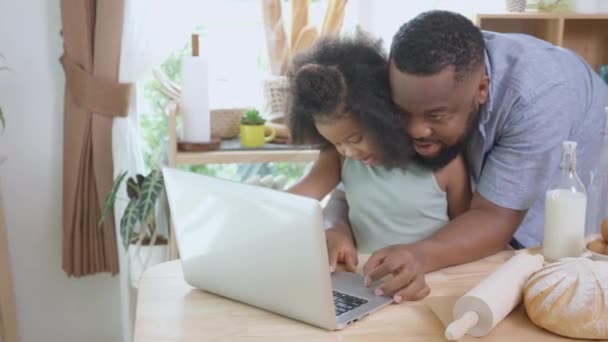 African America Father Daughter Learning Recipe Cooking Online Laptop Computer — Video