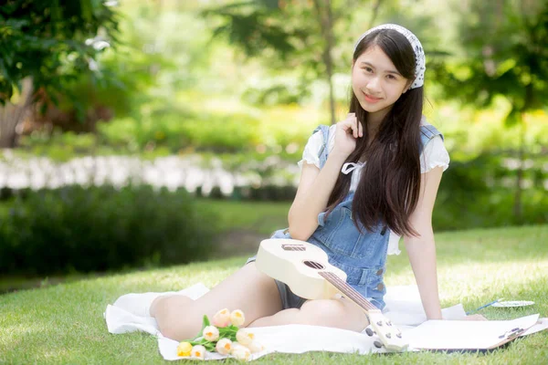 Happiness Young Asian Woman Sitting Playing Ukulele While Relaxation Entertainment — 스톡 사진