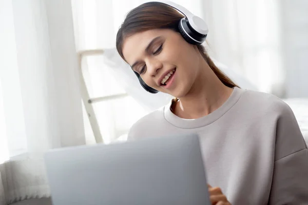 Happy Young Asian Woman Wearing Headphones Listening Music While Using — Foto Stock