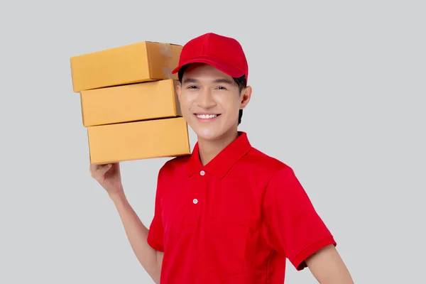 Young Asian Man Uniform Red Cap Standing Carrying Box Stack — Foto de Stock