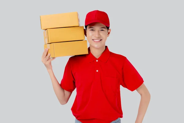 Young Asian Man Uniform Red Cap Standing Carrying Box Stack —  Fotos de Stock