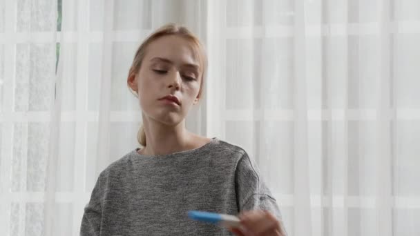 Beautiful Young Caucasian Woman Expression Depressed Unexpected Looking Pregnancy Test — Stok Video