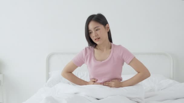 Young Asian Woman Sitting Bed Pain Stomach Bowel Disease Constipation — Stock videók
