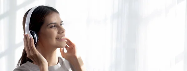 Happy Young Woman Wearing Headphones Listening Music While Dancing Singing — Foto Stock