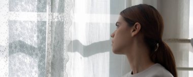 Young caucasian woman is depression and having mental problem in the bedroom at home, emotion and negative, woman loneliness and worry with disappoint, expression and hopelessness, lifestyles concept.
