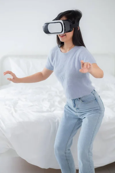 Young Asian Woman Wearing Headset Playing Game Excited Bedroom Home — Photo